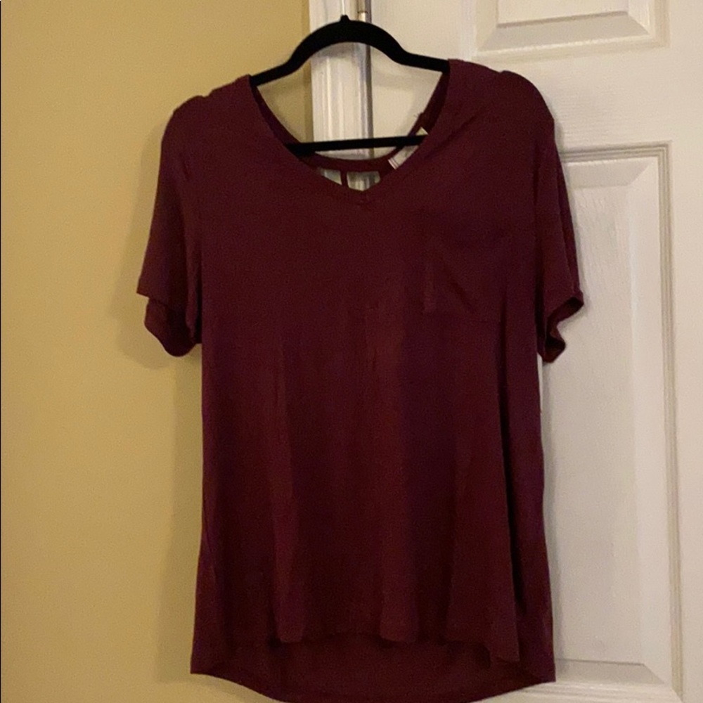 Burgundy top. Open back detail